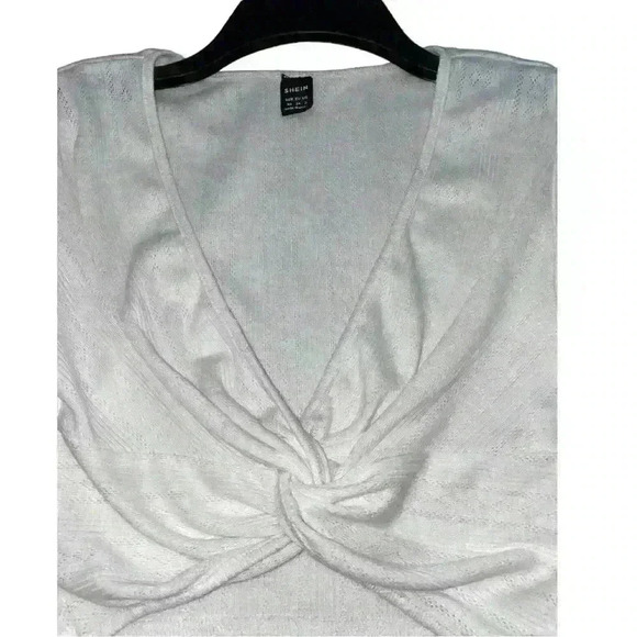 White ruffle sleeve crop top
By Shein Size: XS - Picture 5 of 5